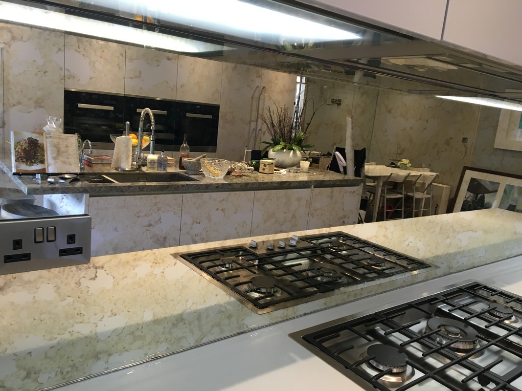 Mirror glass splashback in Hampton luxury kitchen